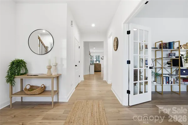a view of a living room and bathroom