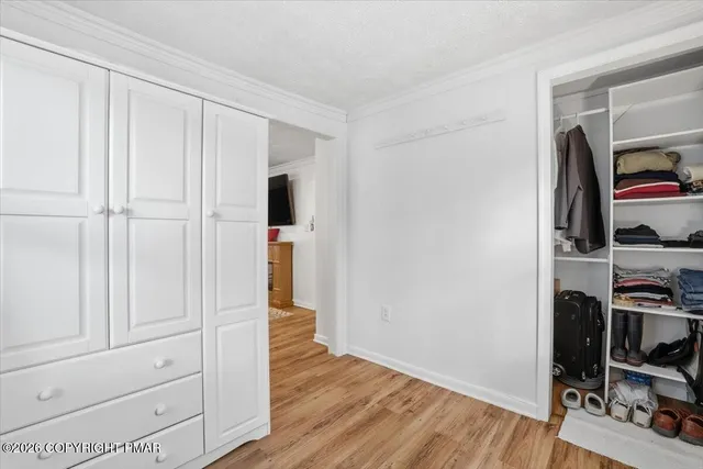 a view of livingroom with furniture and window