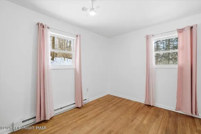 a bathroom with a sink toilet and vanity