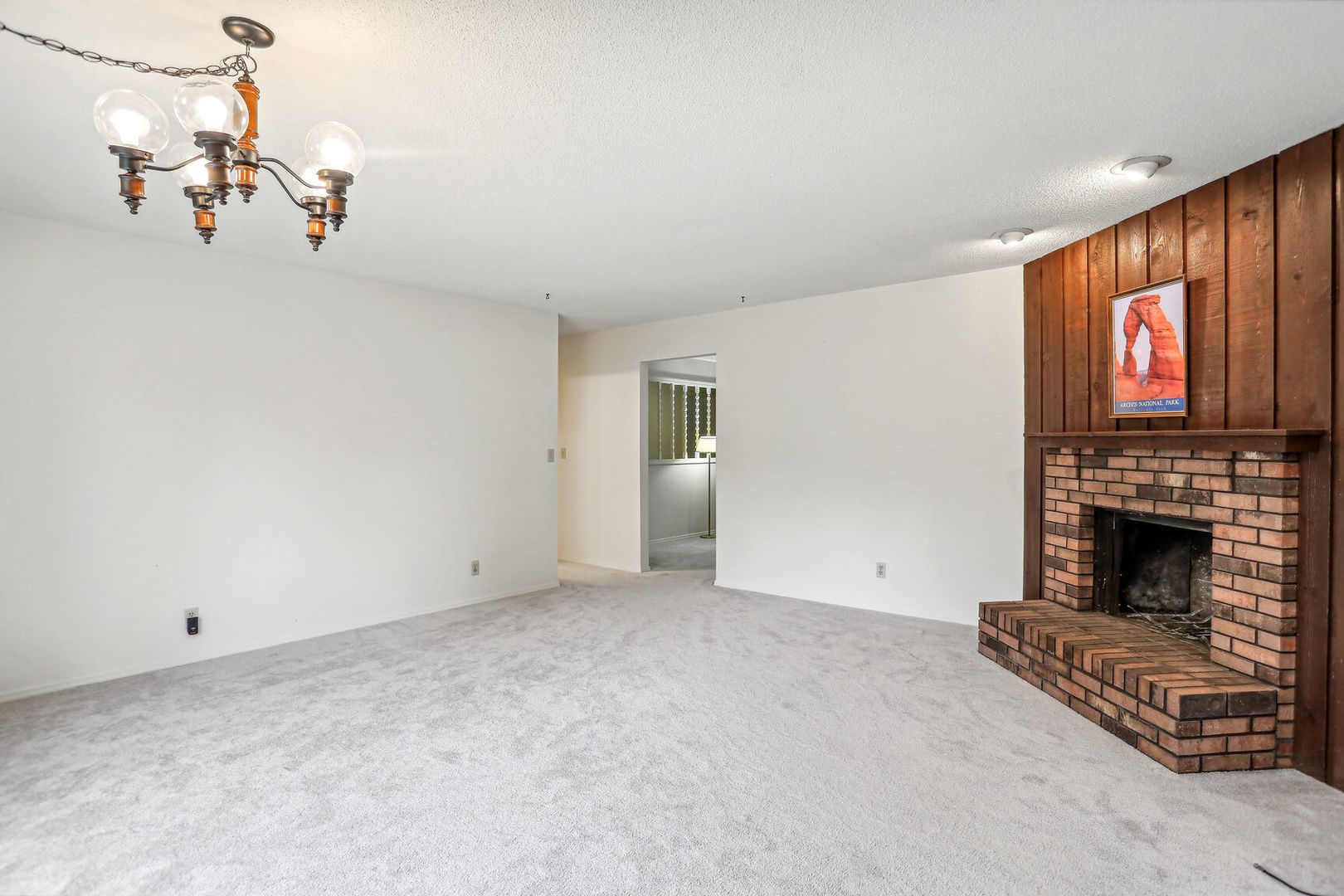 2307 Aspen Drive Champaign, IL 61821 - Photo 12 of 26 a view of empty room with fireplace and wooden floor