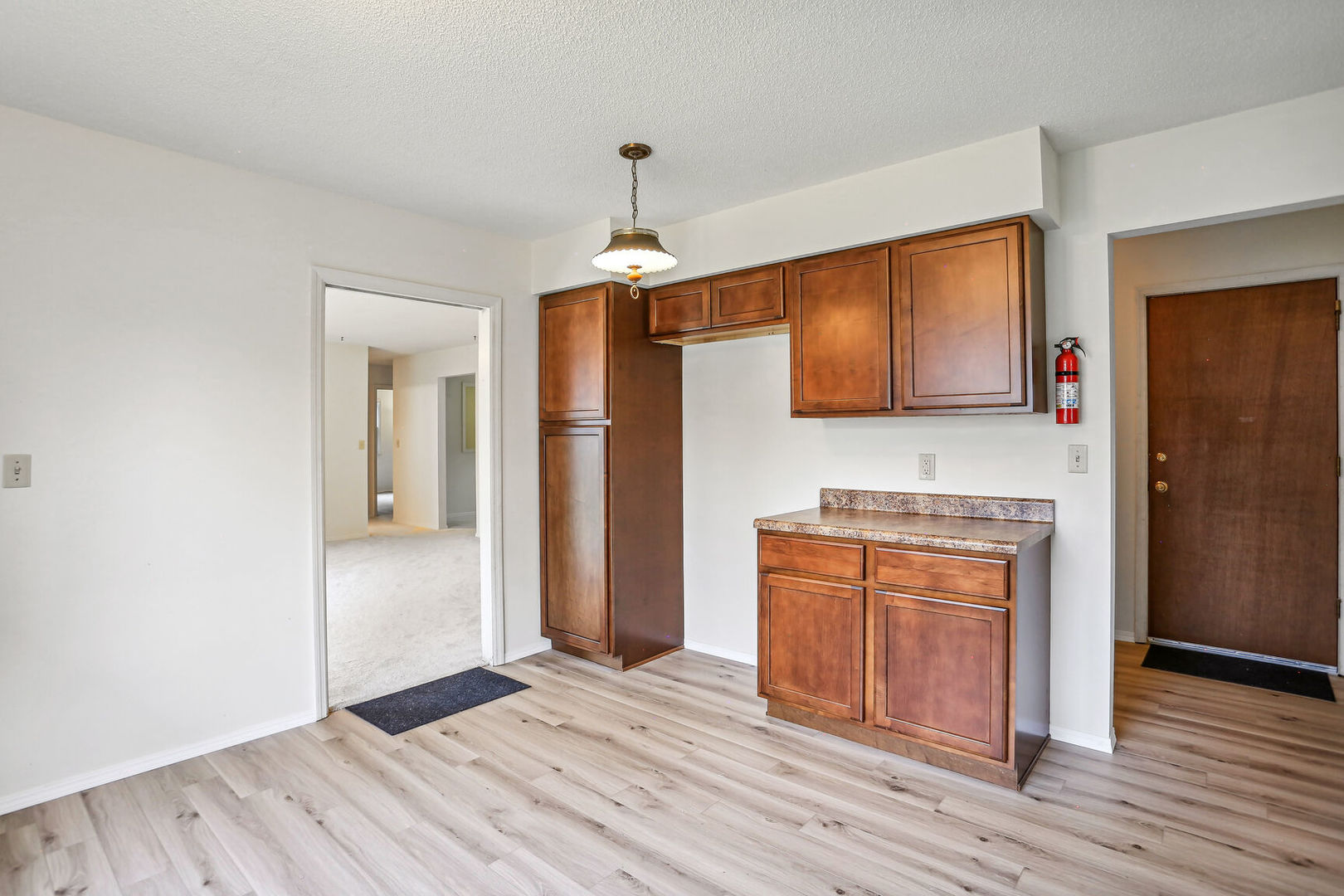 2307 Aspen Drive Champaign, IL 61821 - Photo 14 of 26 a view of a kitchen with a sink and a refrigerator