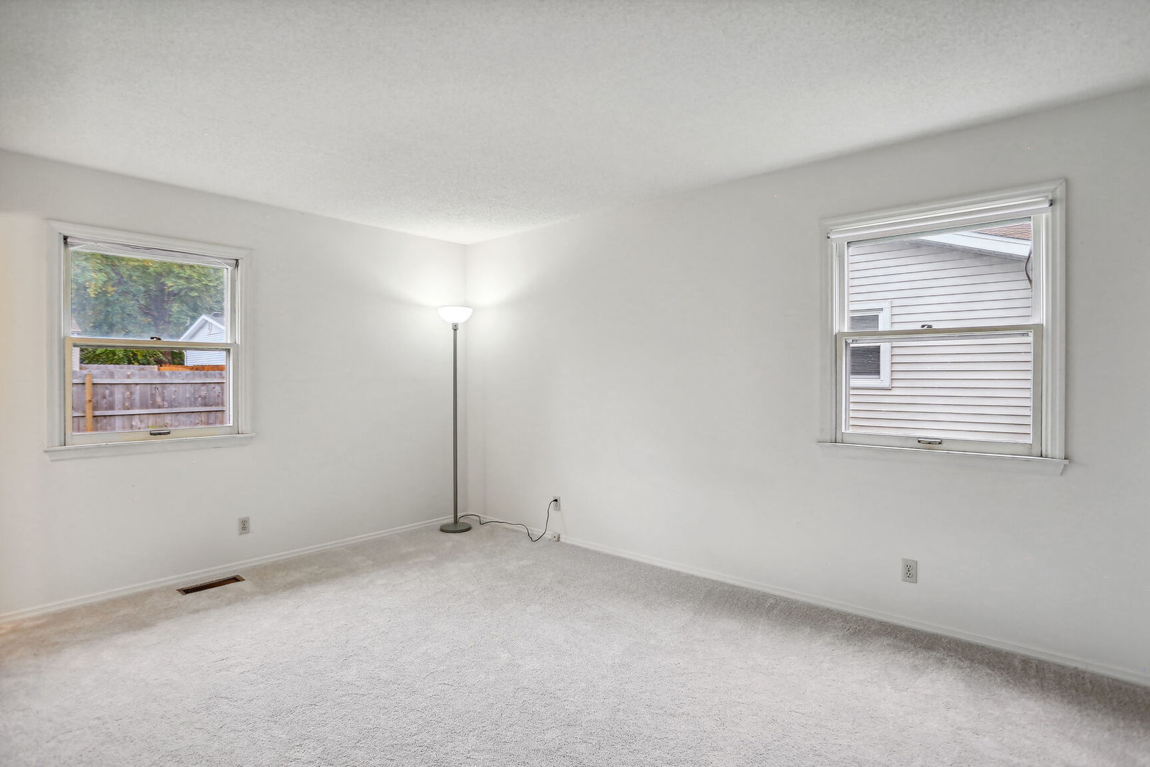 2307 Aspen Drive Champaign, IL 61821 - Photo 20 of 26 an empty room with windows