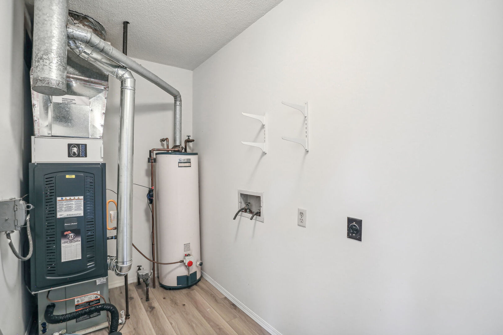 2307 Aspen Drive Champaign, IL 61821 - Photo 25 of 26 a view of a hallway with wooden floor and staircase