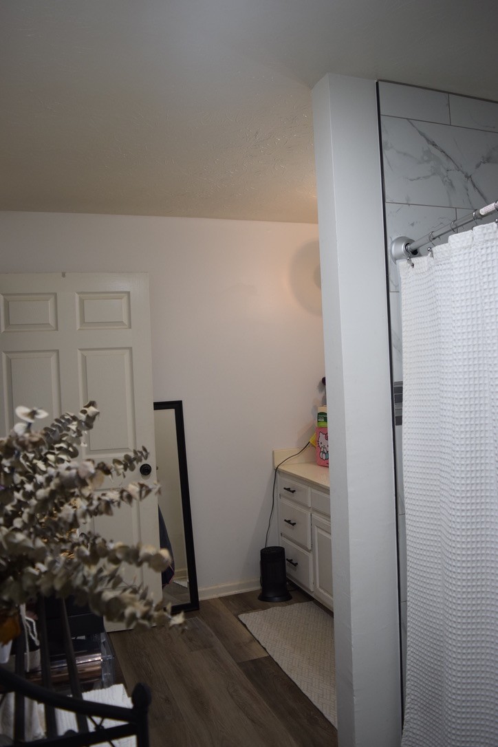 3516 Greens Mill Road Spring Hill, TN 37174 - Photo 15 of 17 a room with water heater and wooden cabinets