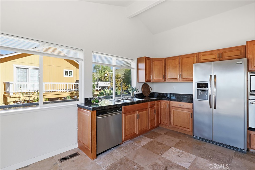 629 Poker Flat Road Copperopolis, CA 95228 - Photo 18 of 71 a kitchen with stainless steel appliances granite countertop a refrigerator and a sink