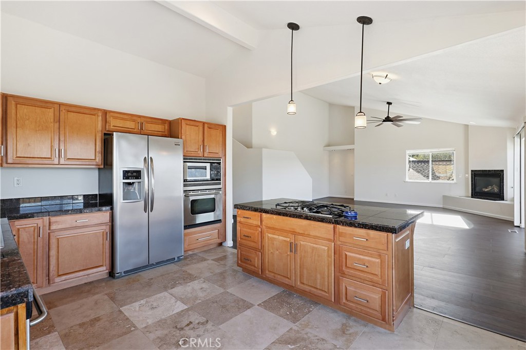 629 Poker Flat Road Copperopolis, CA 95228 - Photo 20 of 71 a kitchen with stainless steel appliances granite countertop a stove a sink and a refrigerator
