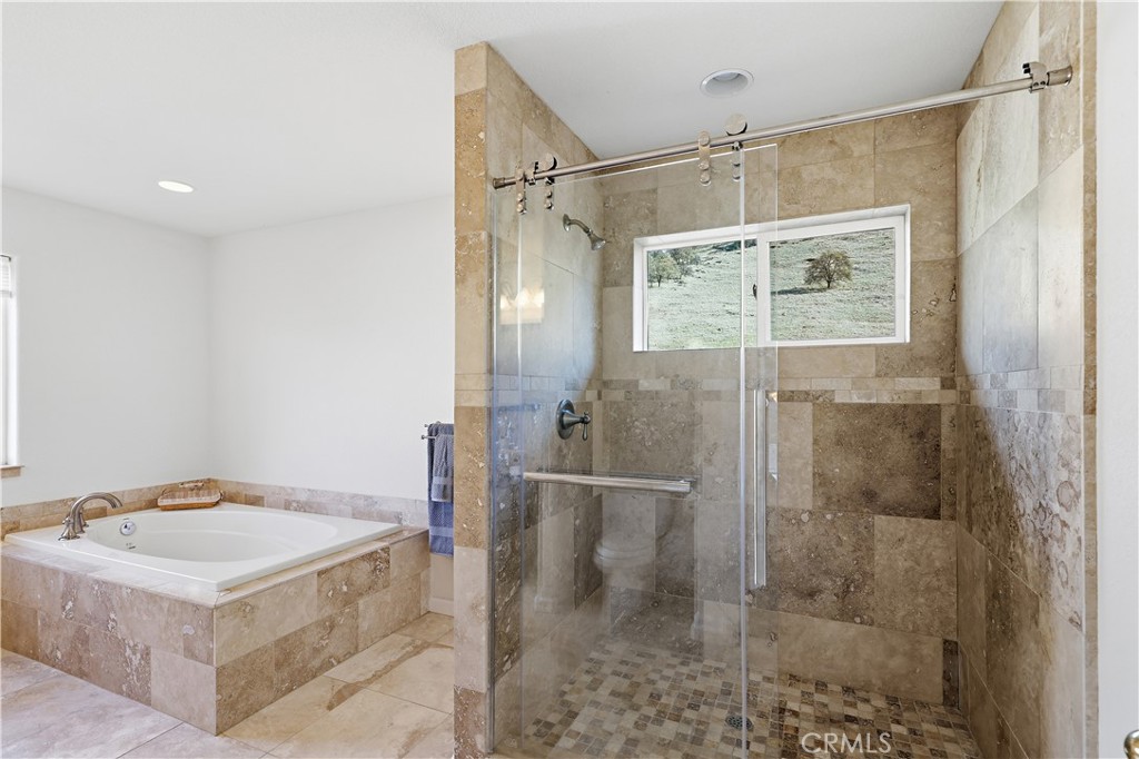 629 Poker Flat Road Copperopolis, CA 95228 - Photo 29 of 71 a bathroom with a shower and a sink