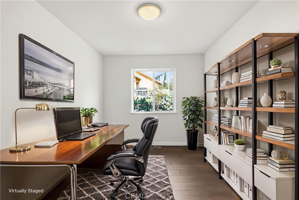 629 Poker Flat Road Copperopolis, CA 95228 - Photo 34 of 71 a workspace with furniture and a book shelf