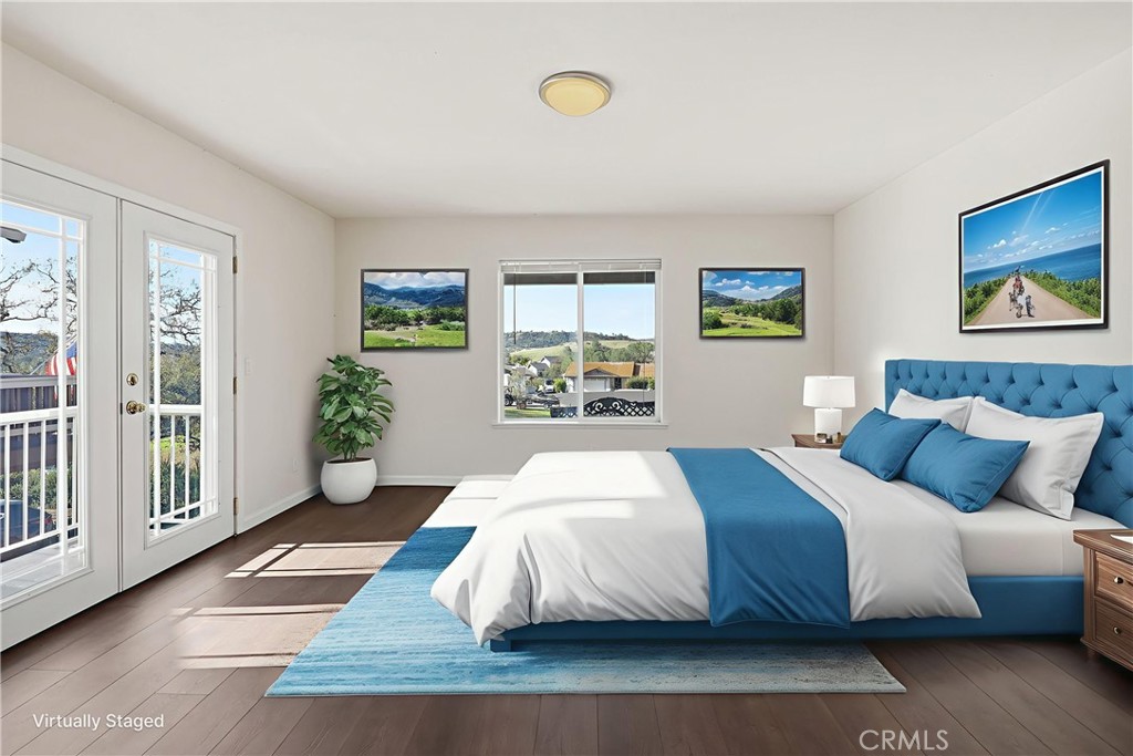 629 Poker Flat Road Copperopolis, CA 95228 - Photo 46 of 71 a bedroom with a bed and painting on the wall