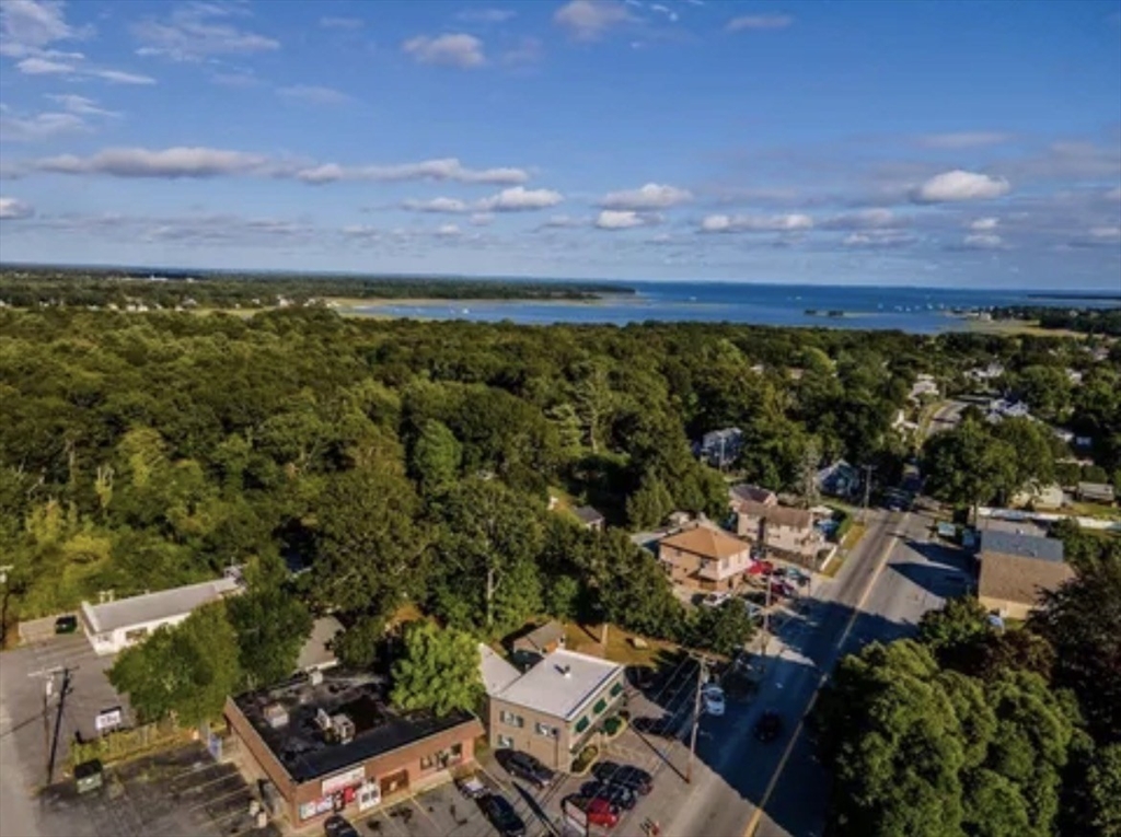 123 Sconticut Neck Road Fairhaven, MA 02719 - Photo 4 of 18 a view of a city with sunset view