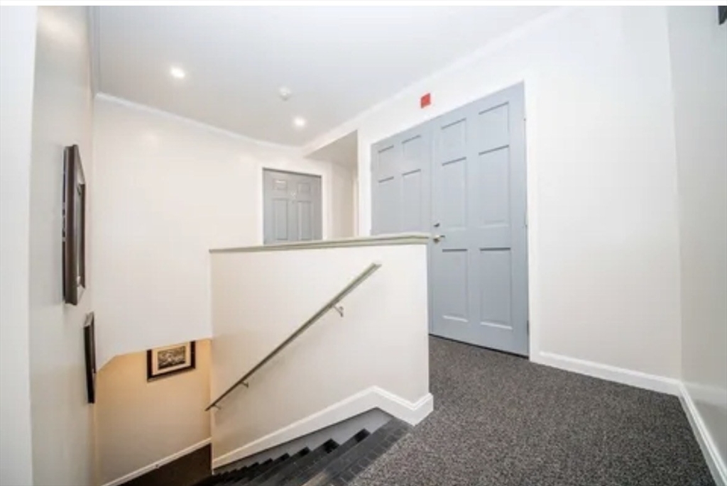 123 Sconticut Neck Road Fairhaven, MA 02719 - Photo 10 of 18 a view of hallway with stairs