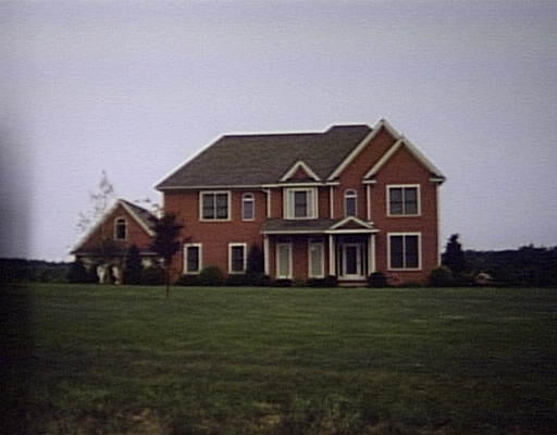 94 Osgood Road Charlton, MA 01507 - Photo 1 of 1 a front view of a house with a garden