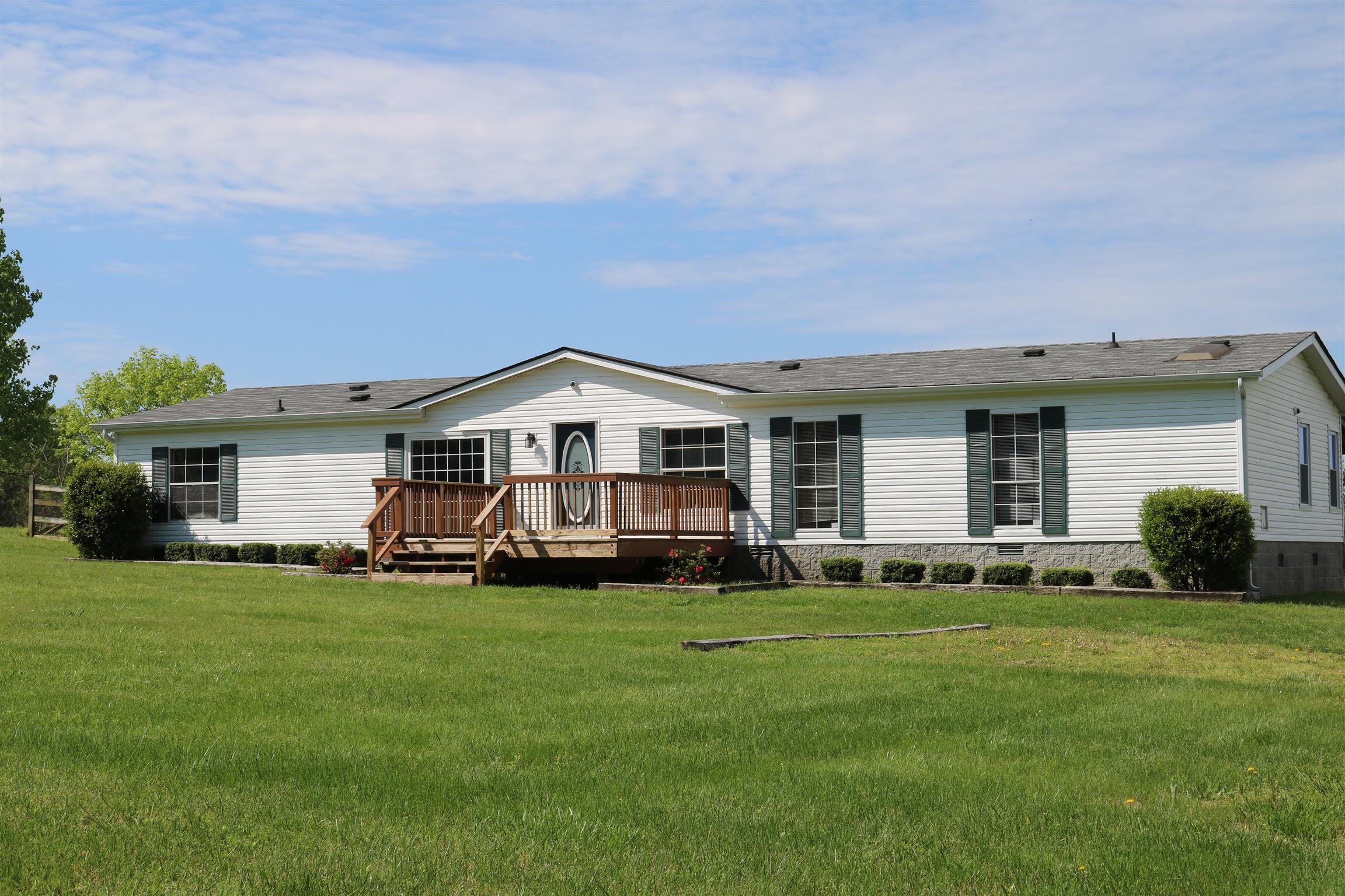 3630 Beasleys Bend Road Lebanon, TN 37087 - Photo 1 of 12 a front view of a house with a yard