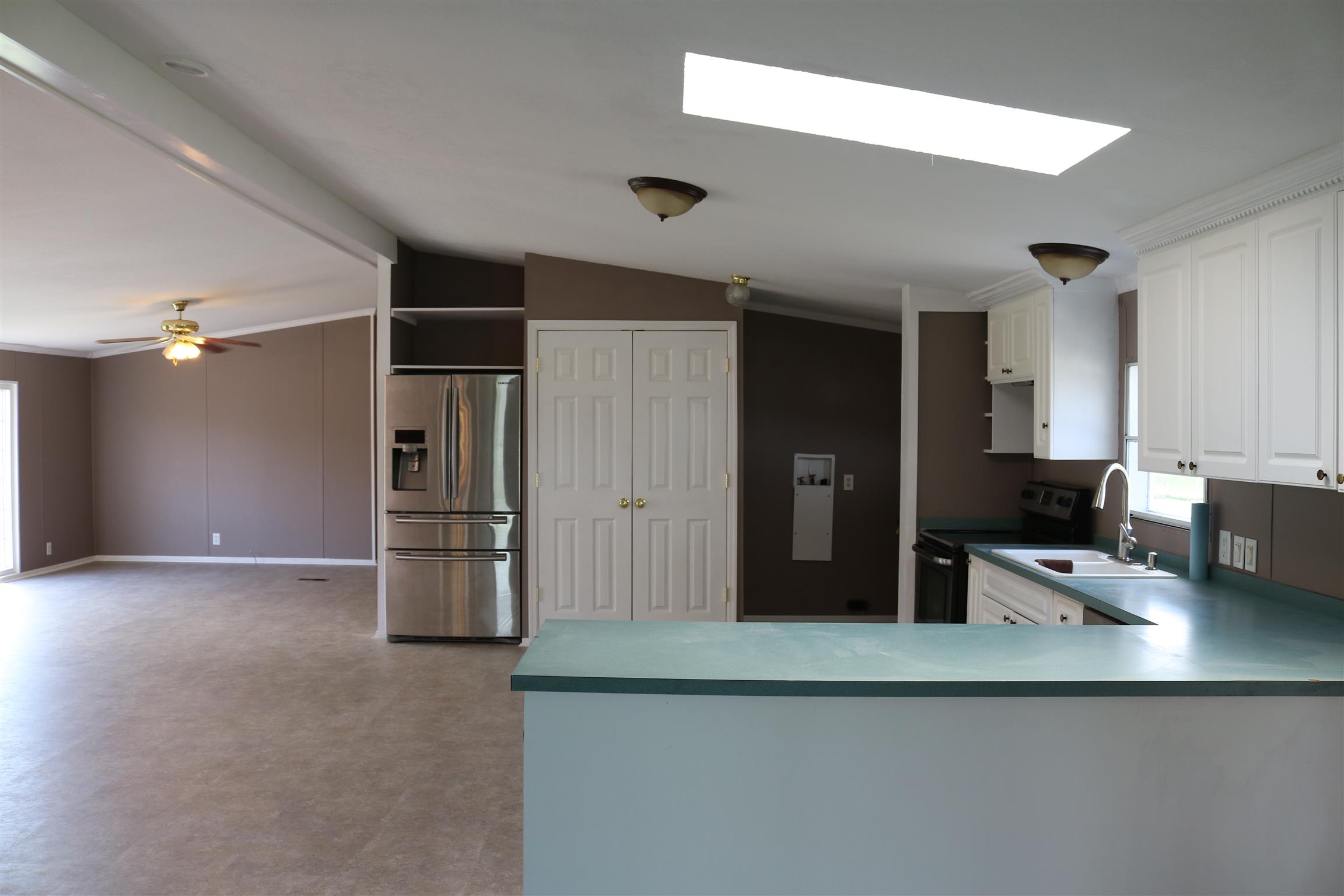 3630 Beasleys Bend Road Lebanon, TN 37087 - Photo 4 of 12 a kitchen with stainless steel appliances granite countertop a refrigerator and a sink