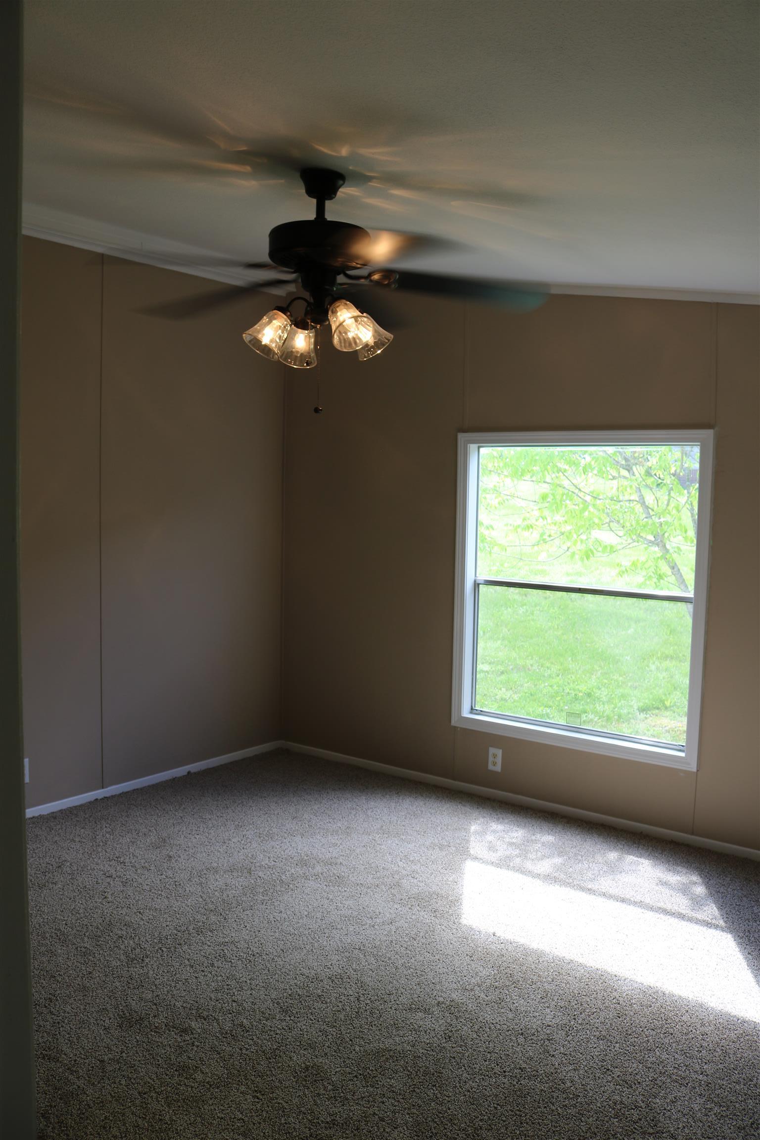 3630 Beasleys Bend Road Lebanon, TN 37087 - Photo 10 of 12 a view of an empty room with a window
