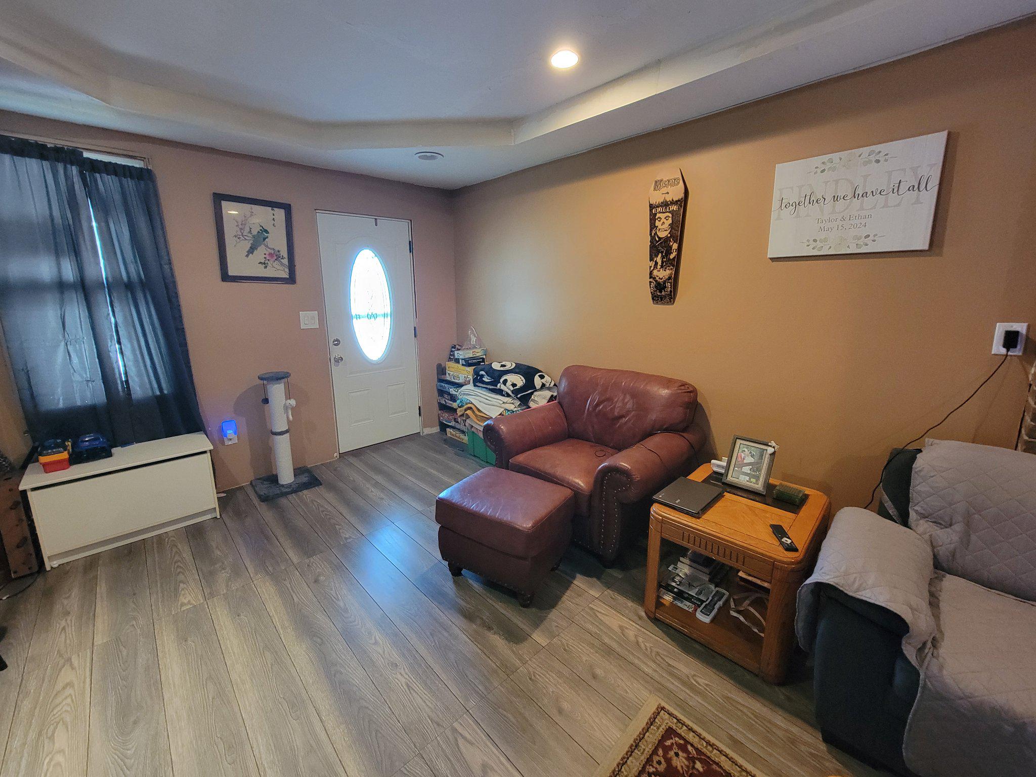 1128 Baltimore Street Hanover, PA 17331 - Photo 2 of 16 Cozy living space with warm tones.