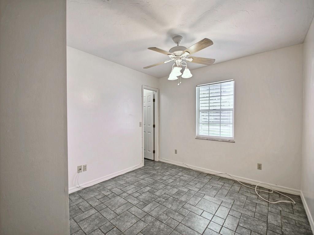 774 24th Square Vero Beach, FL 32962 - Photo 19 of 33 a view of an empty room with a window