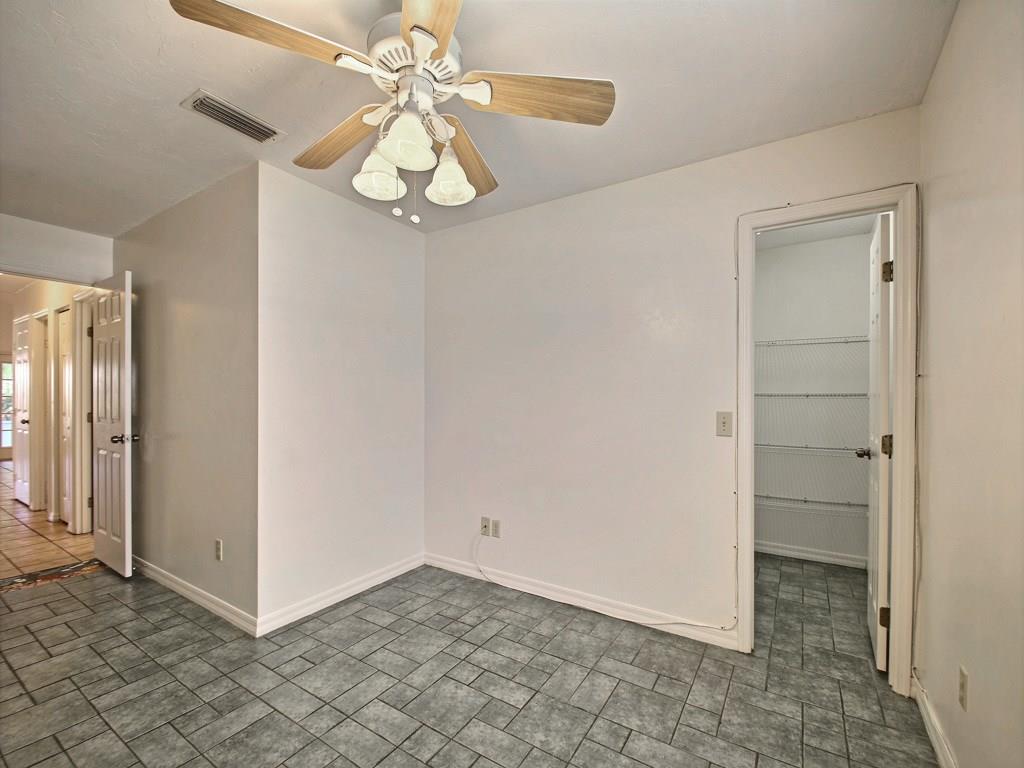 774 24th Square Vero Beach, FL 32962 - Photo 20 of 33 a view of an empty room and chandelier fan