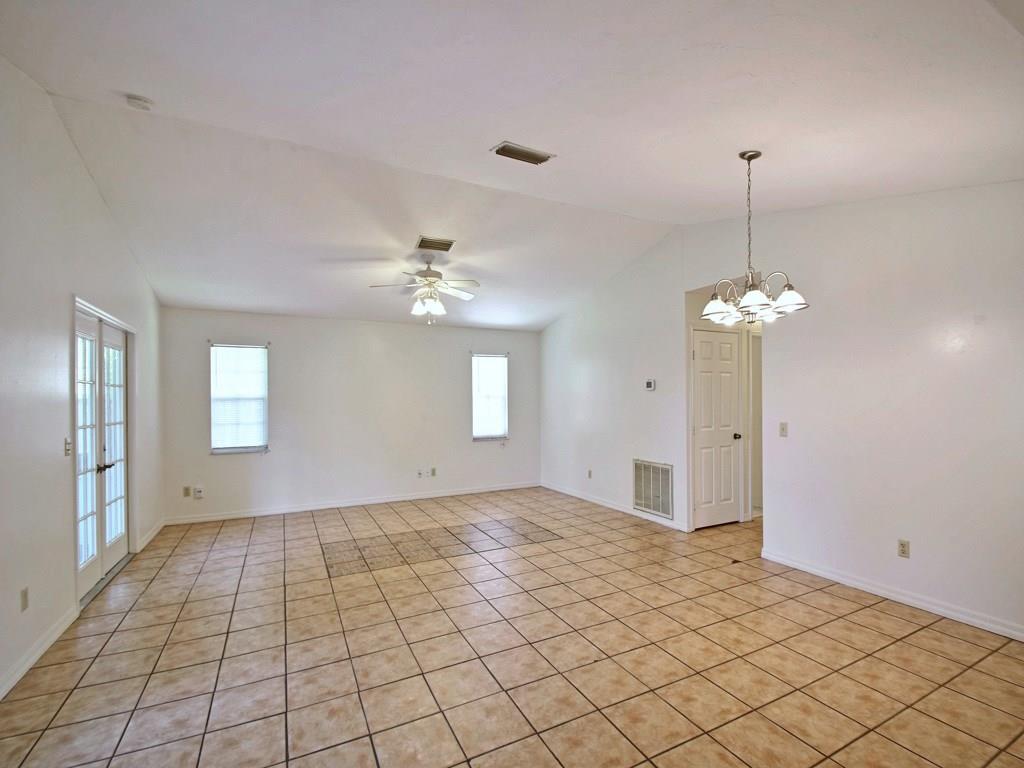 774 24th Square Vero Beach, FL 32962 - Photo 4 of 33 a view of an empty room with glass door