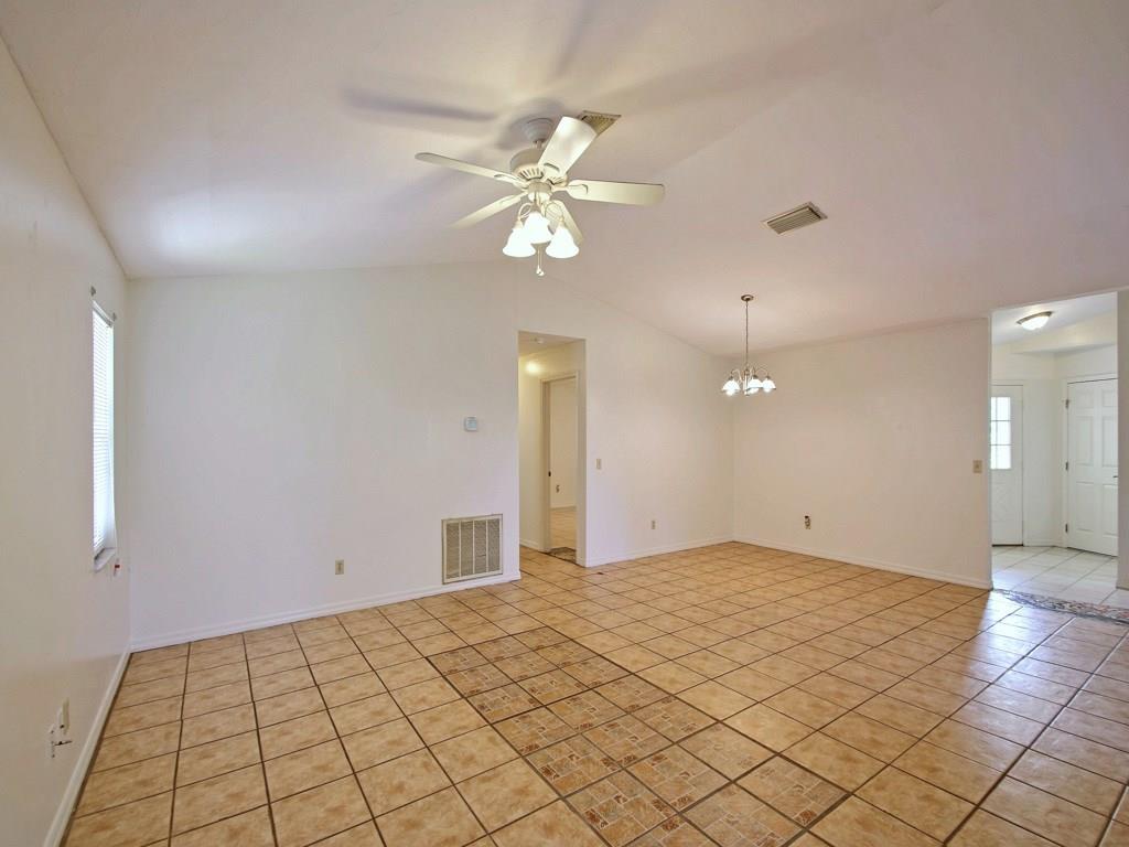 774 24th Square Vero Beach, FL 32962 - Photo 7 of 33 a view of an empty room and chandelier fan