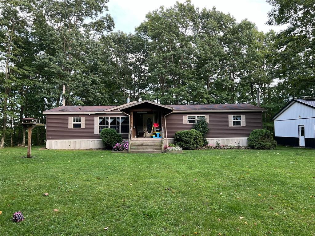 1197 Bonner Road Rossiter, PA 15772 - Photo 1 of 25 a view of a house with a yard and sitting area