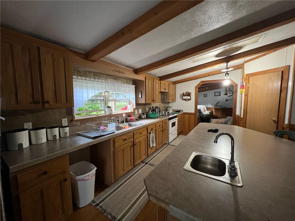 1197 Bonner Road Rossiter, PA 15772 - Photo 12 of 25 a kitchen with a sink and a refrigerator