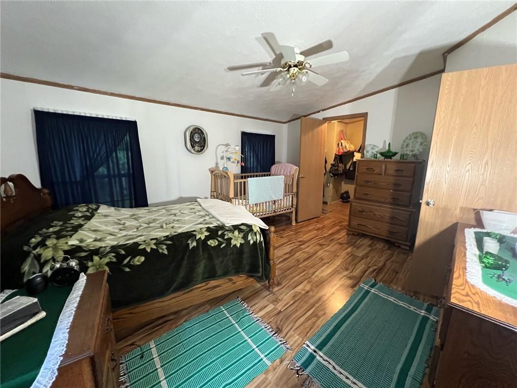 1197 Bonner Road Rossiter, PA 15772 - Photo 20 of 25 a bedroom with a bed and wooden floor