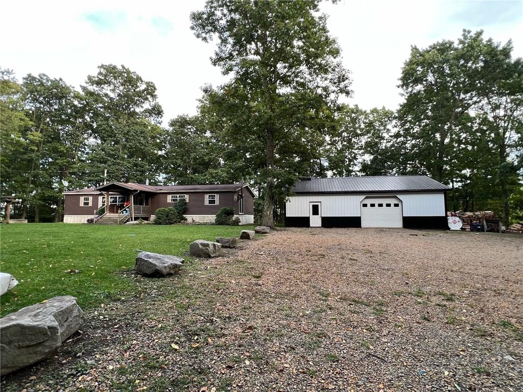 1197 Bonner Road Rossiter, PA 15772 - Photo 2 of 25 a front view of a house with garden
