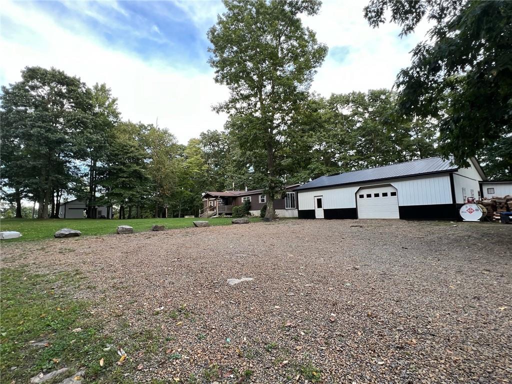 1197 Bonner Road Rossiter, PA 15772 - Photo 3 of 25 a house with trees in the background