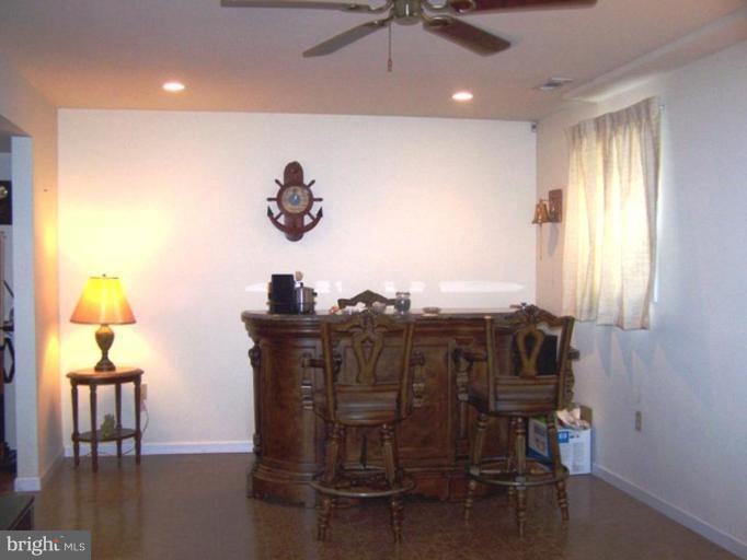 85 Walnut Creek Road Huntingtown, MD 20639 - Photo 15 of 19 a view of a livingroom with furniture