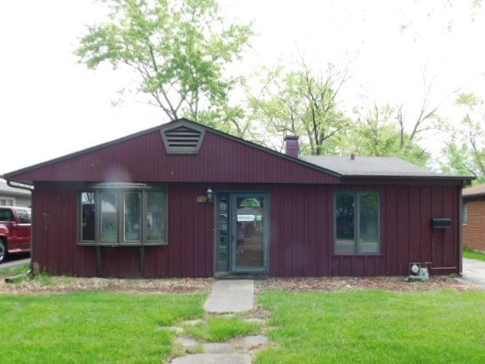 179 George Road Wheeling, IL 60090 - Photo 2 of 12 front view of a house with a yard