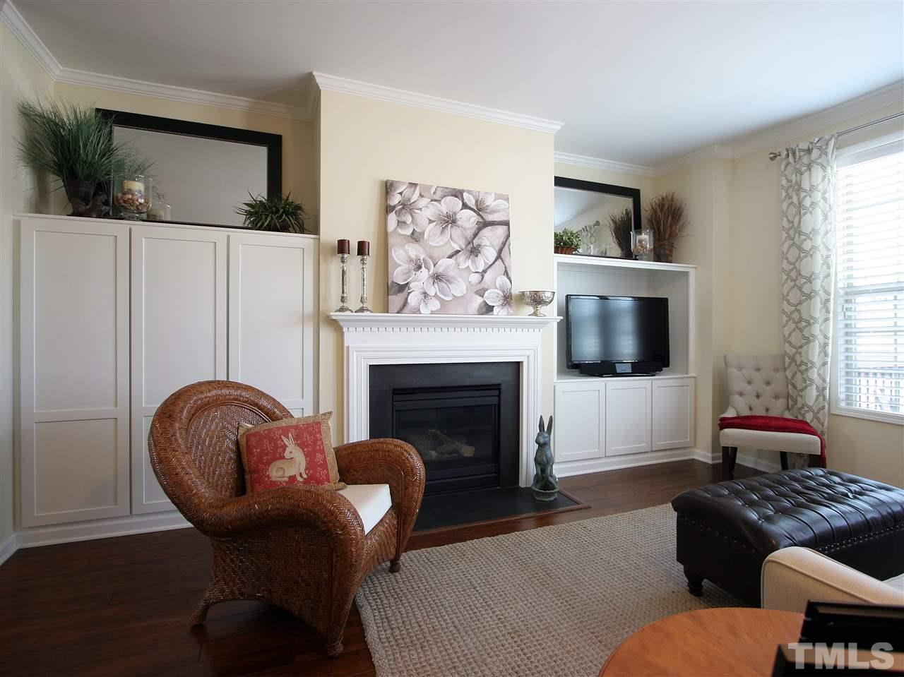 1517 Rodessa Run Raleigh, NC 27607 - Photo 5 of 25 a living room with furniture and a fireplace