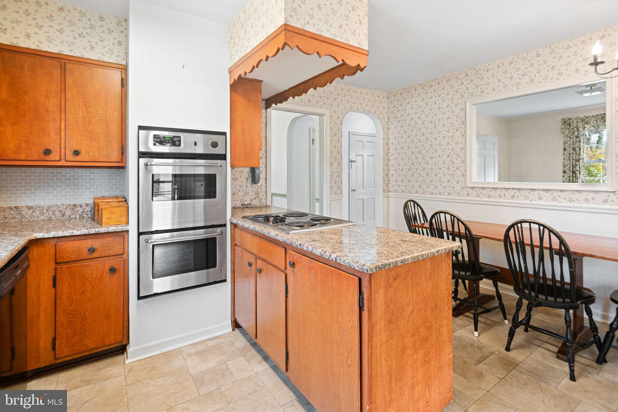 2809 Hunterdon Drive Cinnaminson, NJ 08077 - Photo 11 of 31 a kitchen with stainless steel appliances granite countertop a stove a sink and a refrigerator