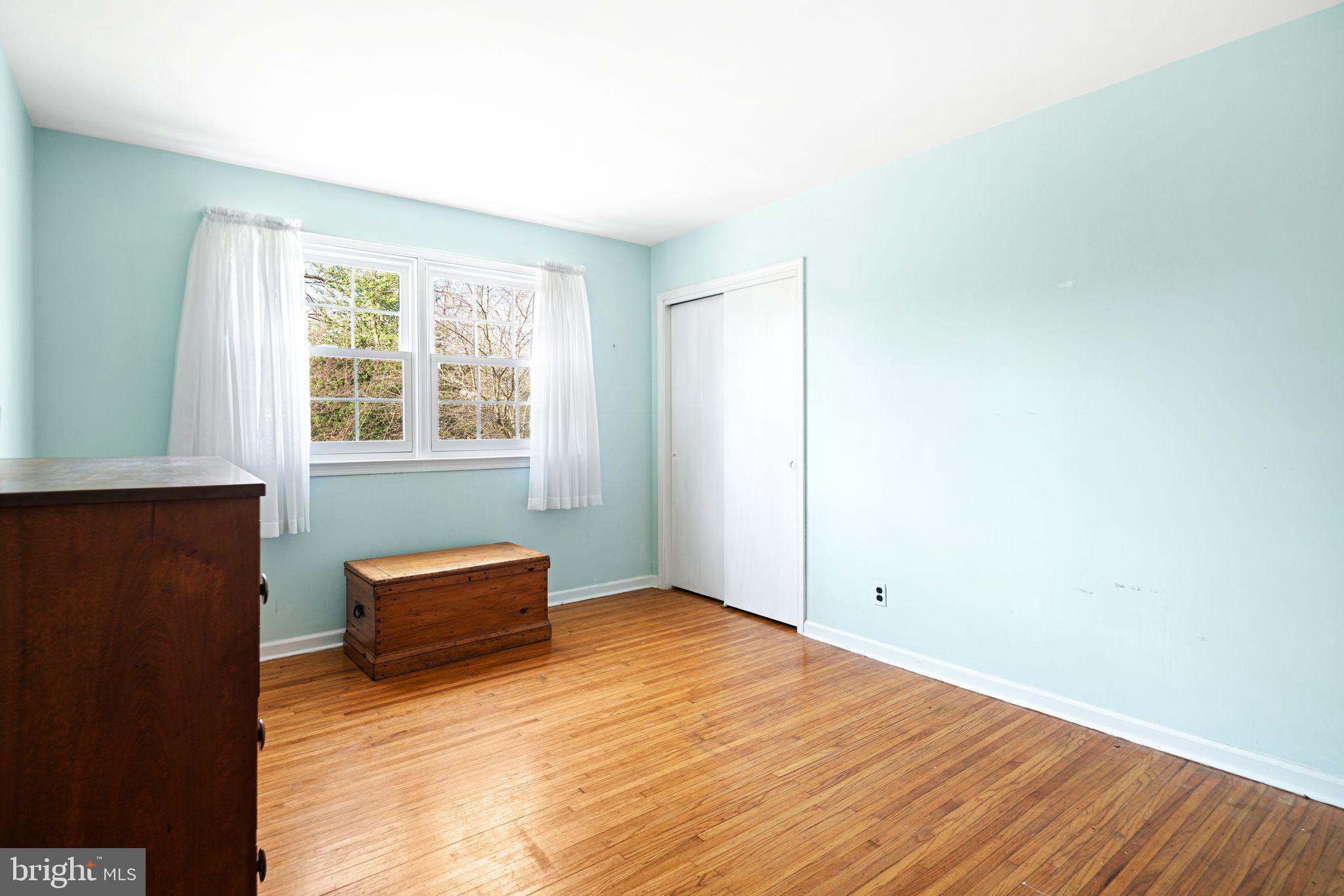 2809 Hunterdon Drive Cinnaminson, NJ 08077 - Photo 24 of 31 an empty room with wooden floor and windows