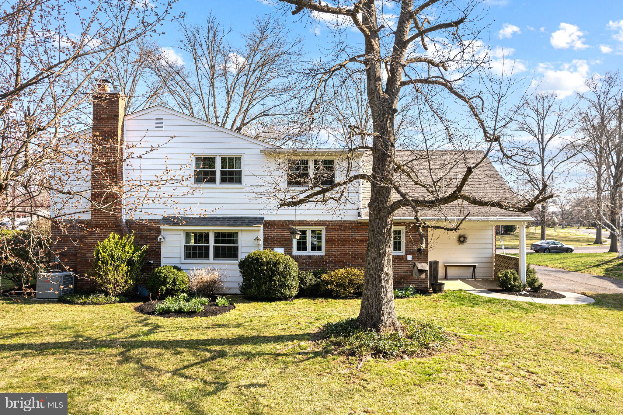 2809 Hunterdon Drive Cinnaminson, NJ 08077 - Photo 26 of 31 a front view of a house with a yard and trees