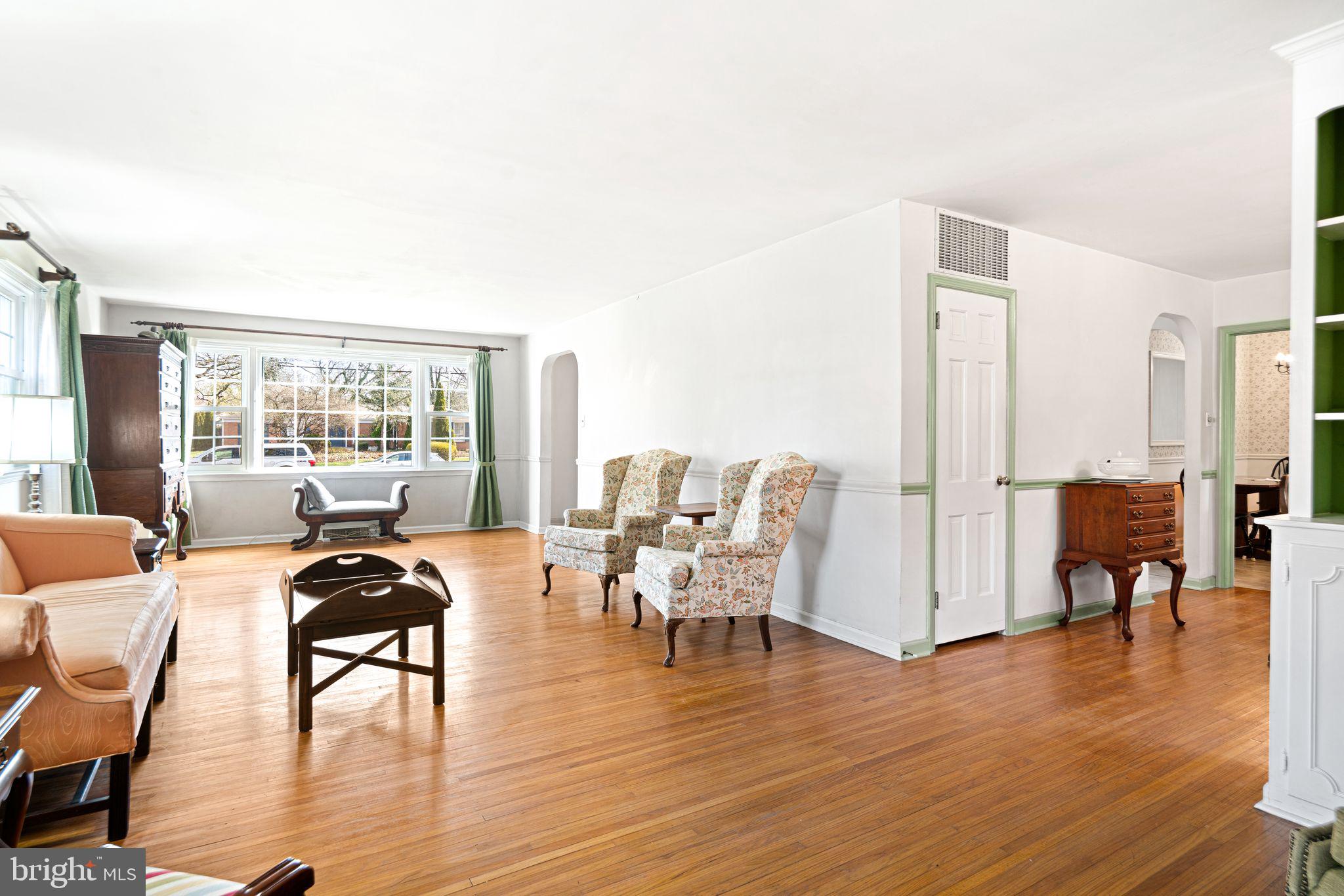 2809 Hunterdon Drive Cinnaminson, NJ 08077 - Photo 5 of 31 a view of a dining room with furniture window and wooden floor