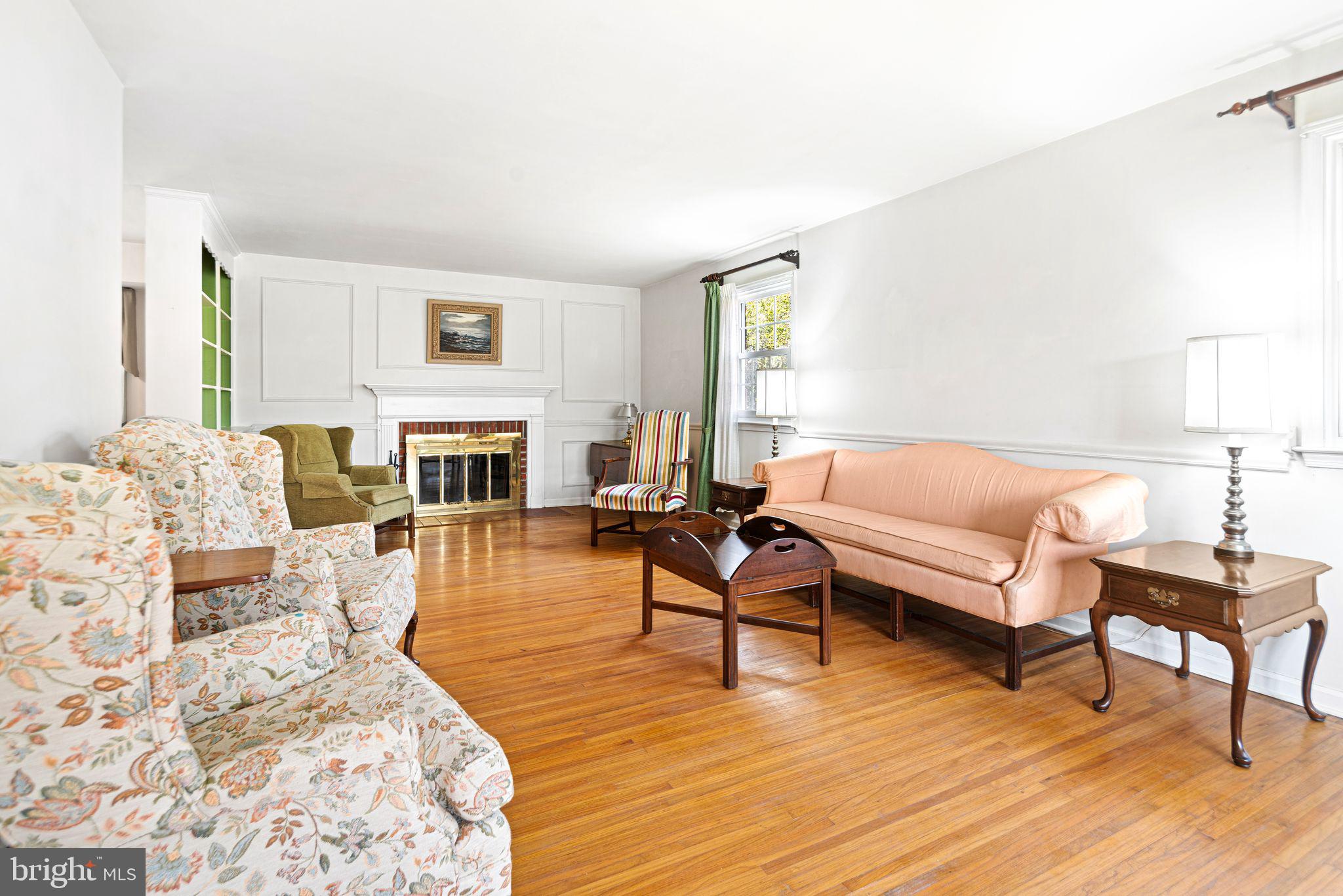 2809 Hunterdon Drive Cinnaminson, NJ 08077 - Photo 6 of 31 a living room with furniture and a fireplace