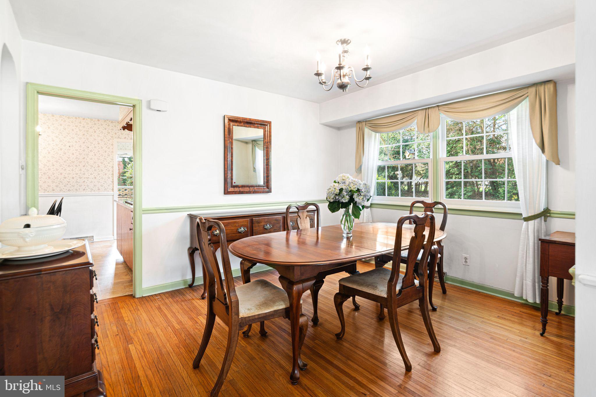 2809 Hunterdon Drive Cinnaminson, NJ 08077 - Photo 7 of 31 a view of a dining room with furniture window and wooden floor
