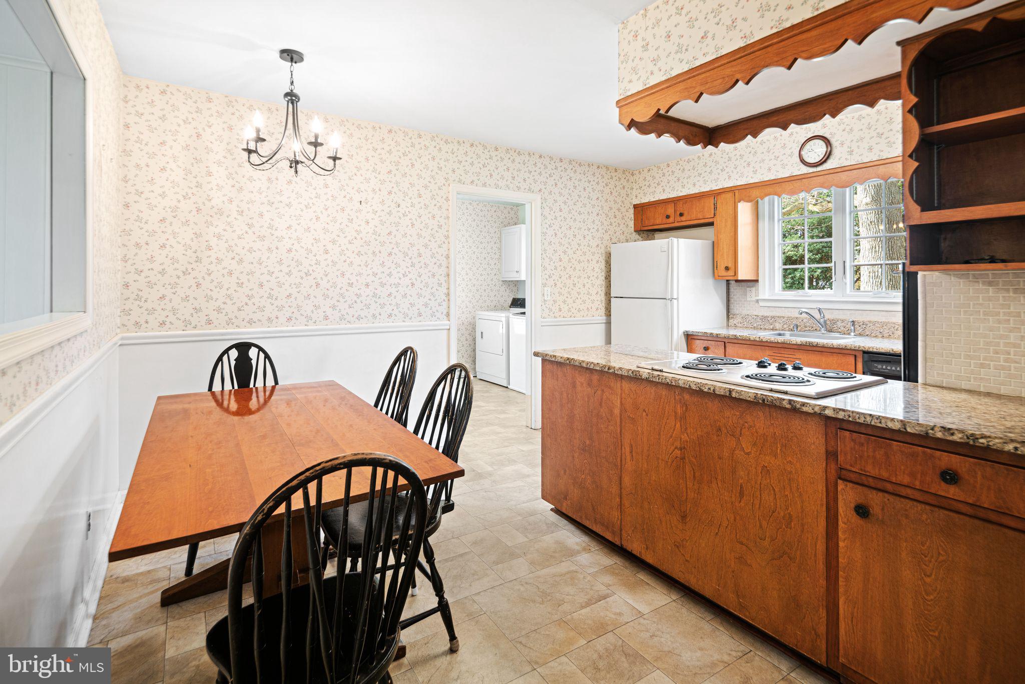 2809 Hunterdon Drive Cinnaminson, NJ 08077 - Photo 9 of 31 a view of a dining room with furniture and chandelier