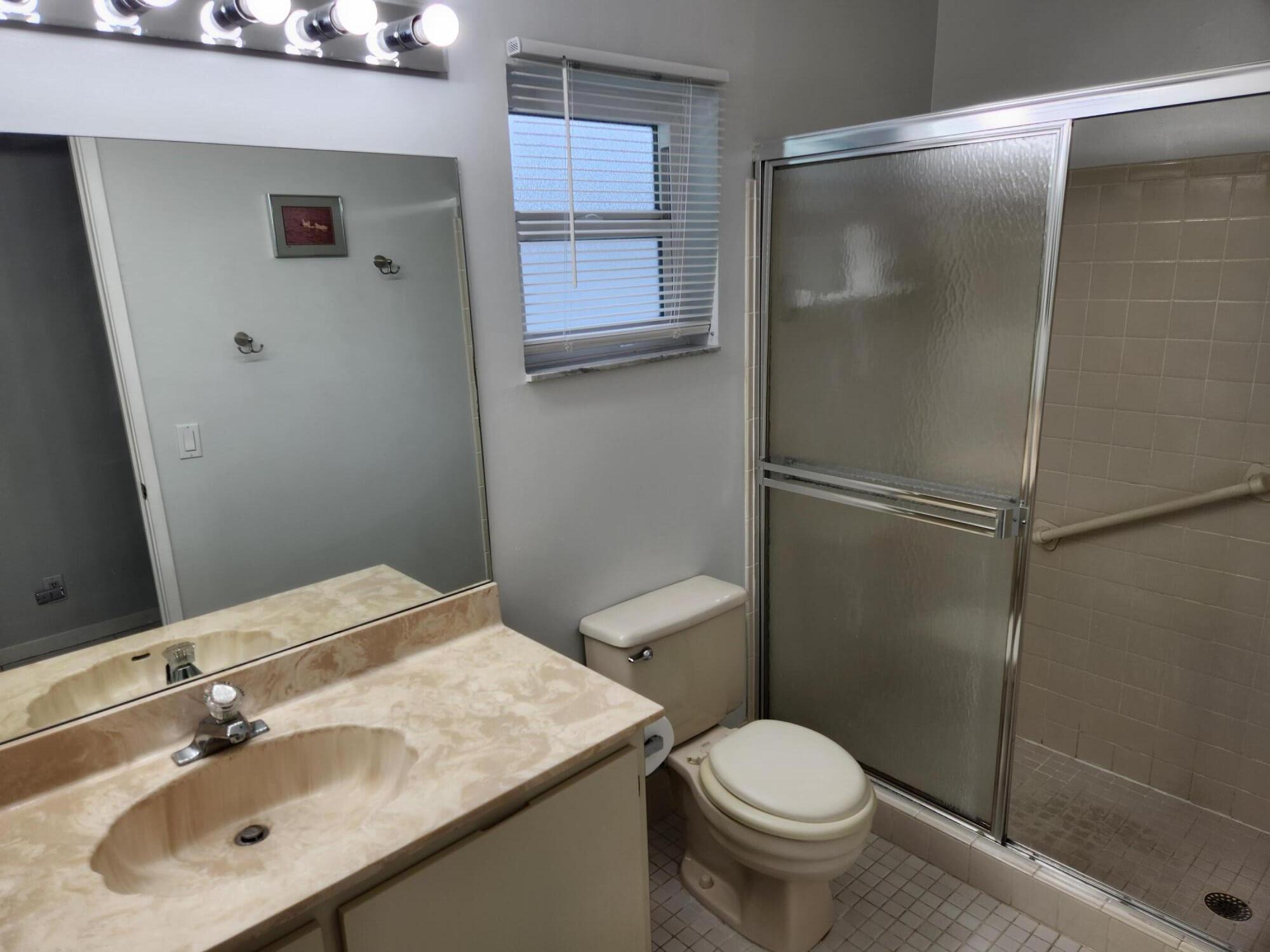 18541 Cherborg Drive, Unit D Boca Raton, FL 33496 - Photo 12 of 36 Master Bathroom w/Step-in Shower