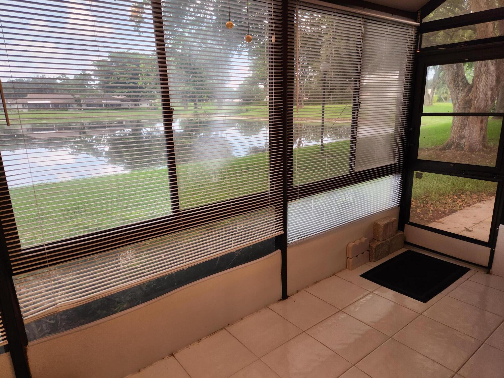 18541 Cherborg Drive, Unit D Boca Raton, FL 33496 - Photo 17 of 36 Encl. Porch windows & Screens