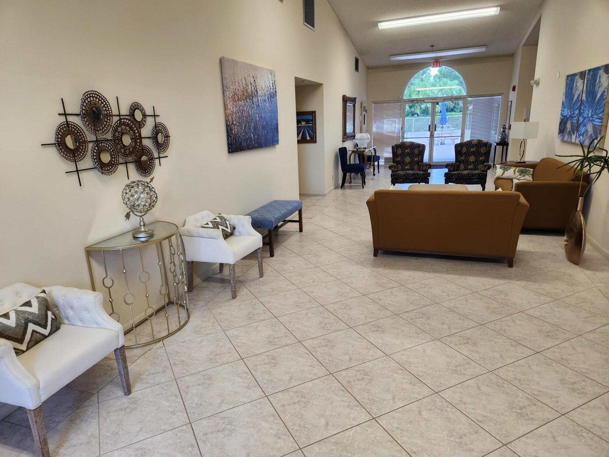 18541 Cherborg Drive, Unit D Boca Raton, FL 33496 - Photo 20 of 36 Clubhouse Lobby