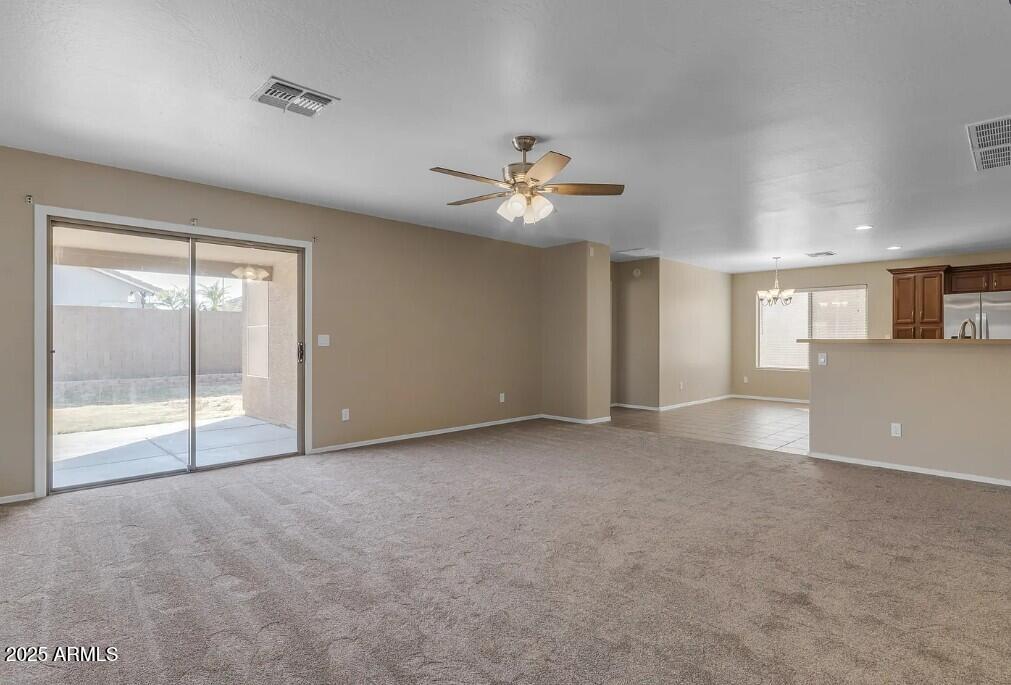 2199 West Tanner Ranch Road San Tan Valley, AZ 85144 - Photo 16 of 38 an empty room with fan and windows