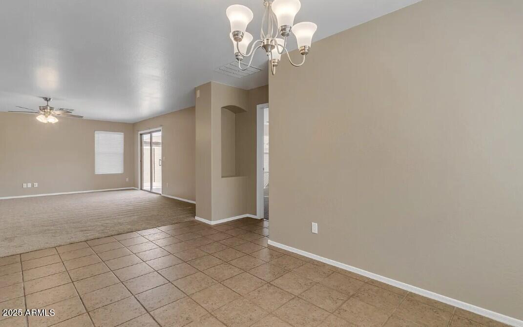 2199 West Tanner Ranch Road San Tan Valley, AZ 85144 - Photo 5 of 38 a view of a chandelier fan and entryway