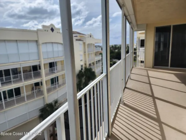 a view of a building from a balcony