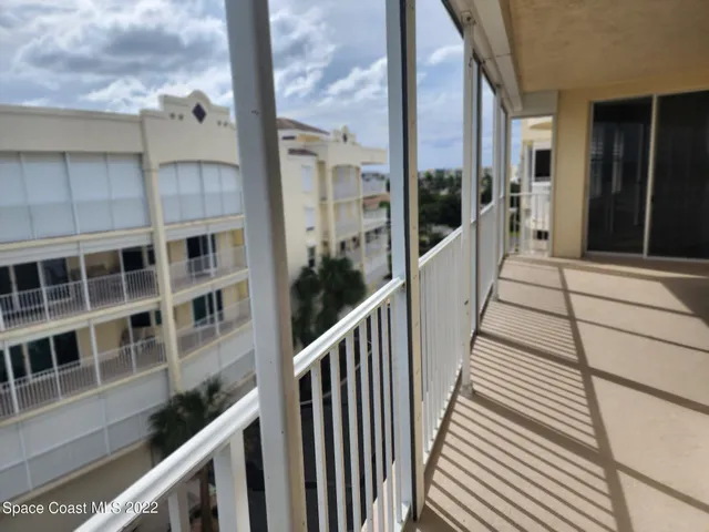 a view of a building from a balcony