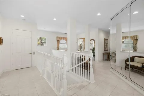 a view of a livingroom with furniture and windows