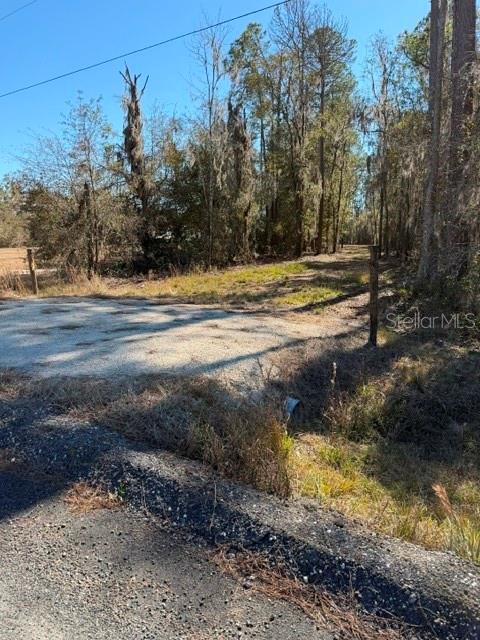 155th Way Starke, FL 32091 - Photo 20 of 29 a view of swimming pool with a yard
