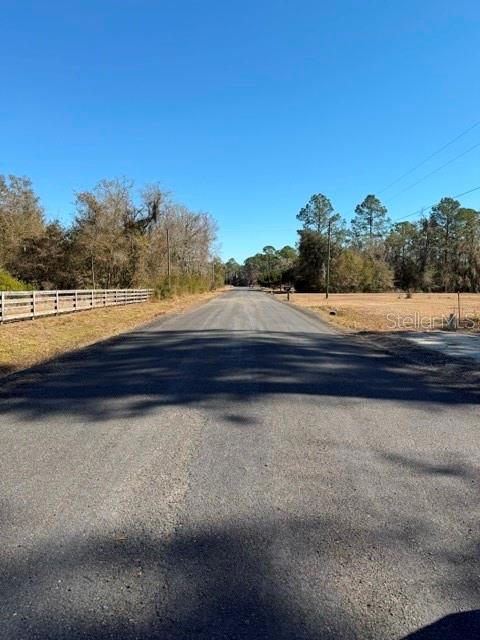 155th Way Starke, FL 32091 - Photo 24 of 29 a view of a swimming pool and lake view