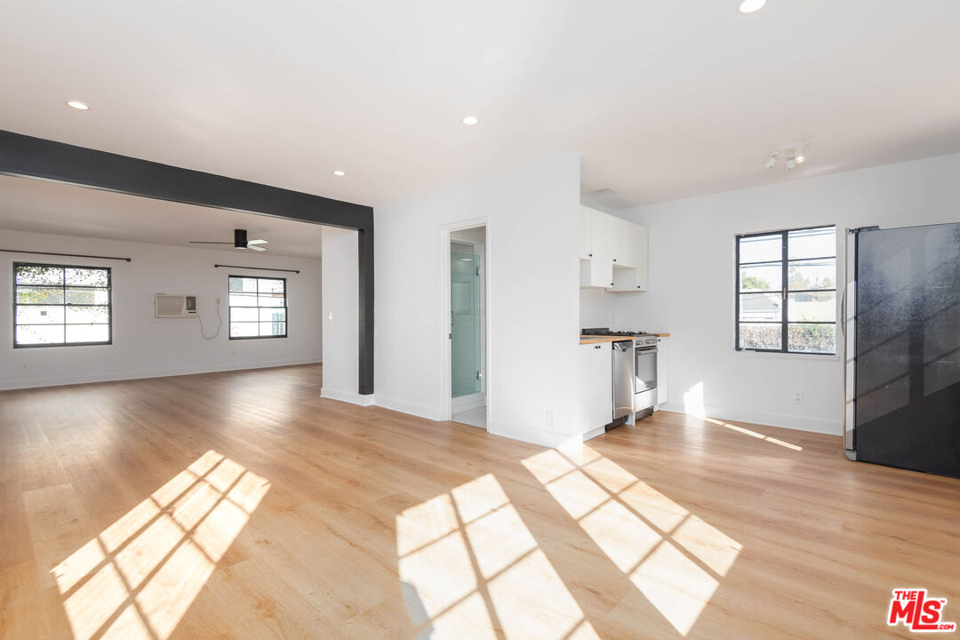 822 North Detroit Street, Unit 826 5 Los Angeles, CA 90046 - Photo 7 of 14 a view of a living room with windows